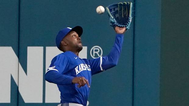 Royals outfielder Michael A. Taylor catches a ball.